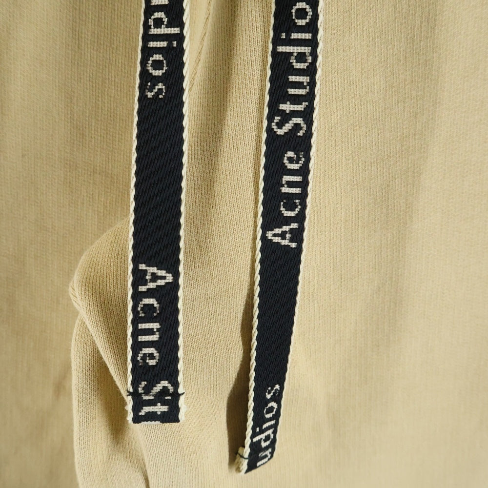 Acne Studios(アクネ ストゥディオズ) FADED BLACK FLEECE TROUSERS フェイディッド ドローストリング ロゴデザイン フリースパンツ イエロー FN-WN-TROU000169