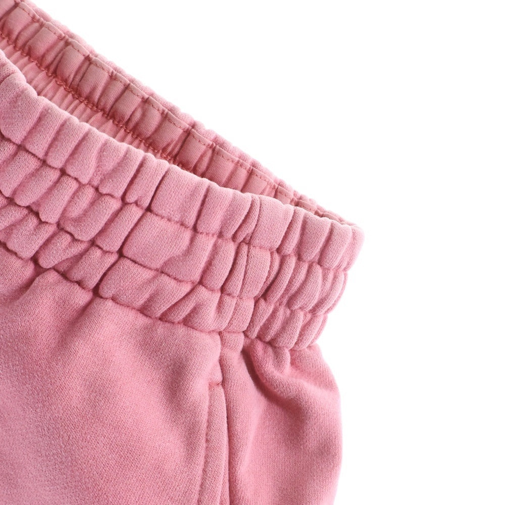 UNKNOWN LONDON(アンノーンロンドン) ラインストーン クロスデザイン スウェットパンツ ピンク