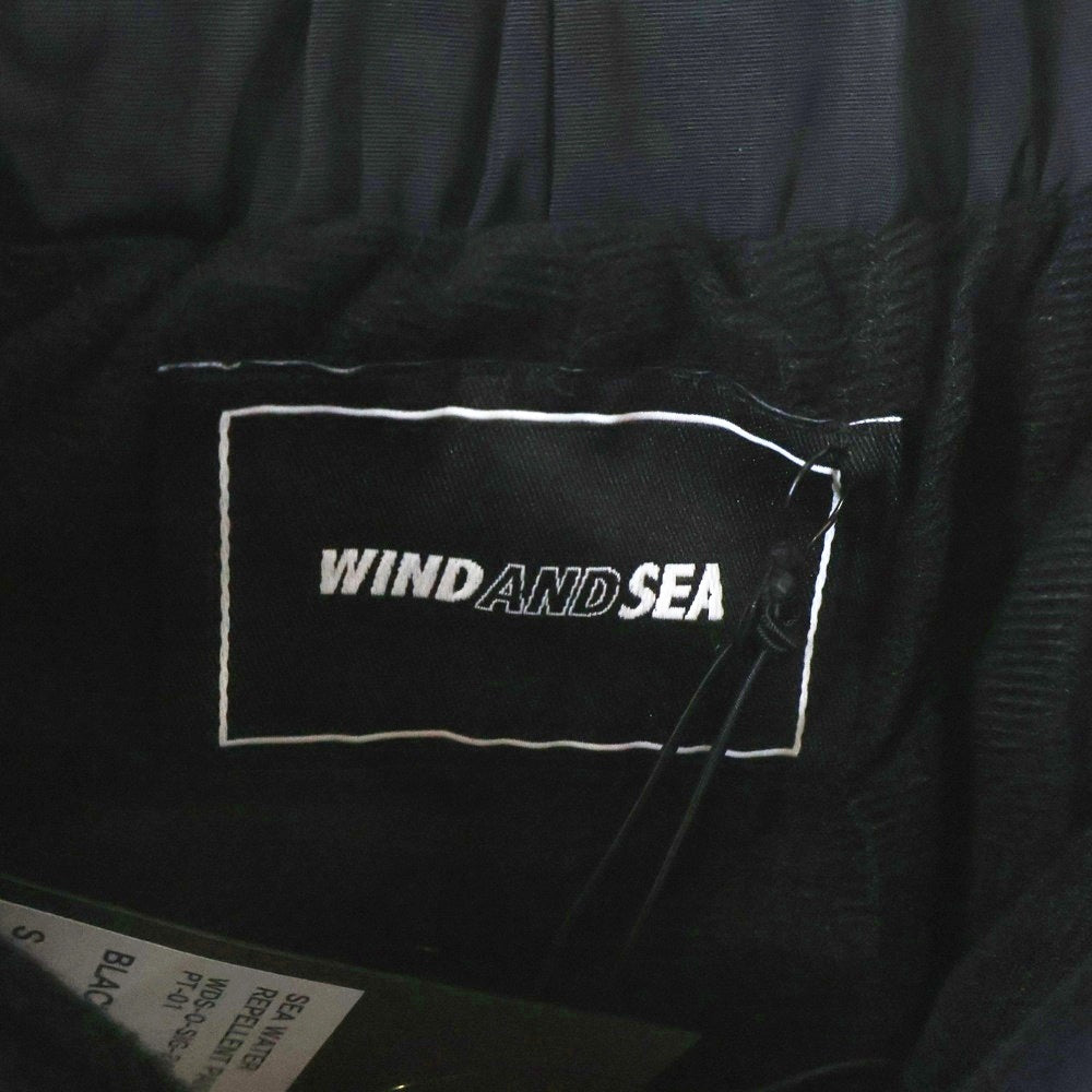 WIND AND SEA(ウィンダンシー) 24SS SEA WATER REPELLENT PANTS ロゴプリント レぺレントナイロンパンツ ブラック WDS-0-SIG-24-Q3-PT-01