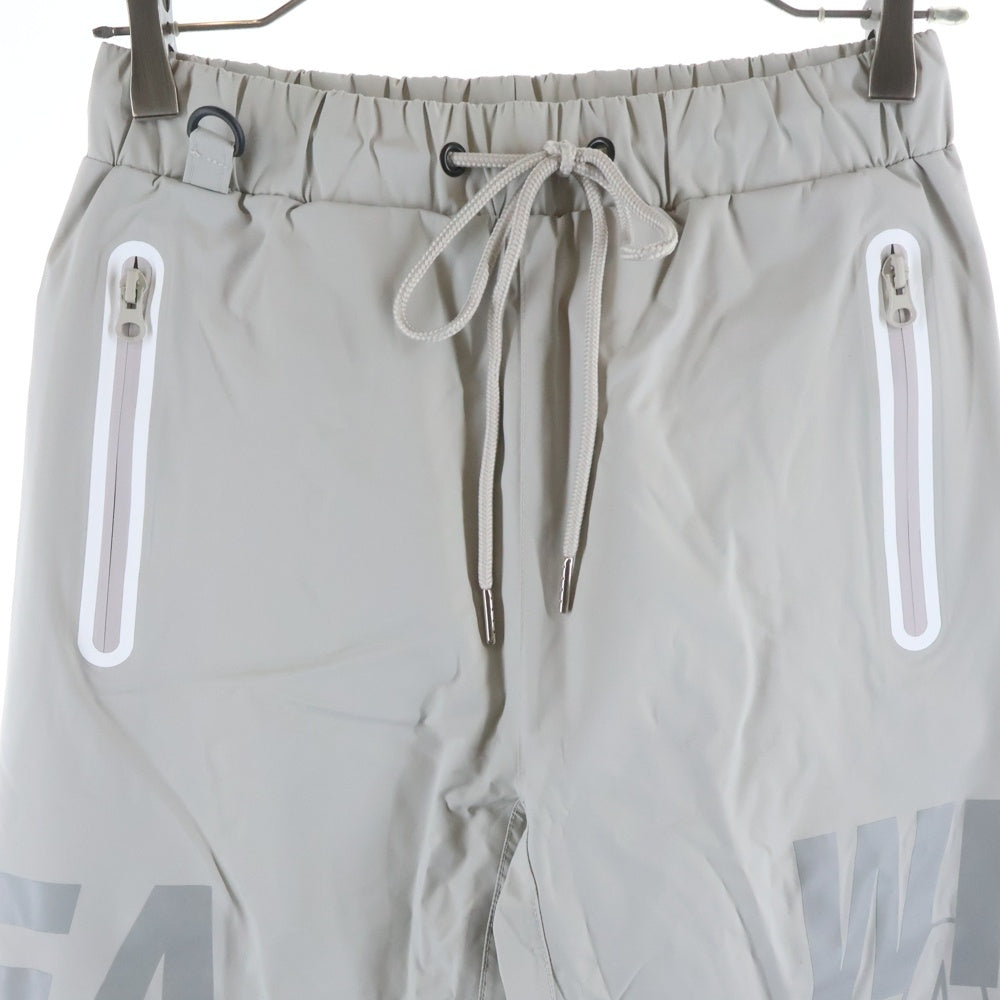 WIND AND SEA(ウィンダンシー) 24SS SEA WATER REPELLENT PANTS ロゴプリント レぺレントナイロンパンツ グレー WDS-0-SIG-24-Q3-PT-01