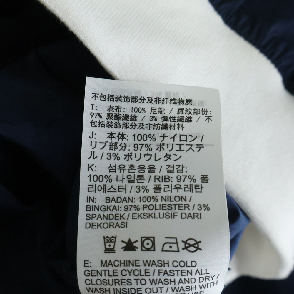 NIKE(ナイキ) NIKE AS W NSW ESSTL WVN UV LS VNCK ARMORY エッセンシャルウーブン ナイロン Vネック 長袖トップス ネイビー レディース FV7650-480