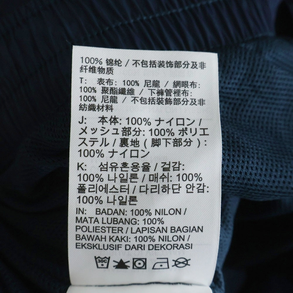 NIKE(ナイキ) LNSWESS OS ロゴ刺繍 ウーブン ナイロン ジョガーパンツ ネイビー レディース FV7669-478