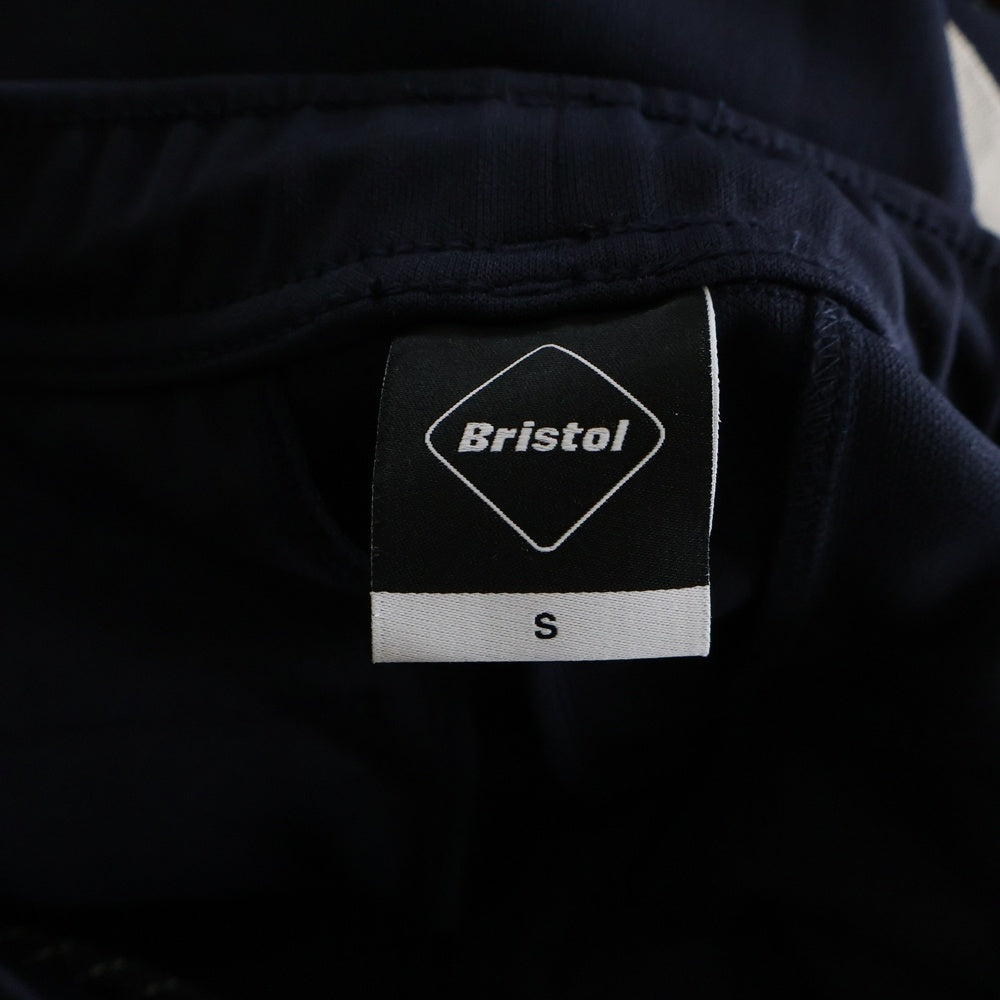 F.C.R.B./F.C.Real Bristol/FCRB(エフシーアールビー/エフシーレアルブリストル) 25SS TRAINING TRACK PANTS ロゴパッチ サイドライン トレーニング トラックパンツ ネイビー FCRB-250064