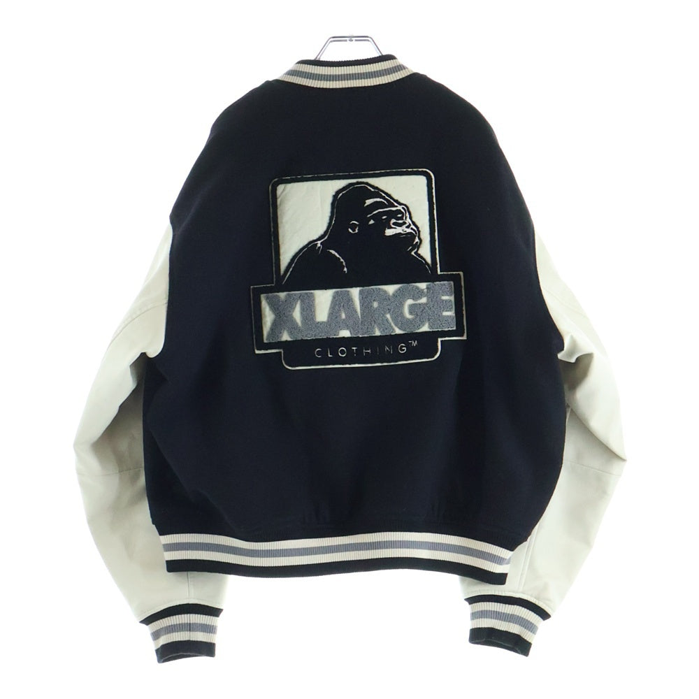 X-LARGE(エクストララージ) 23AW OG LOGO VARSITY JACKET ロゴエンブロイダリー アームレザー切替 バーシティジャケット ブラック 101234021009