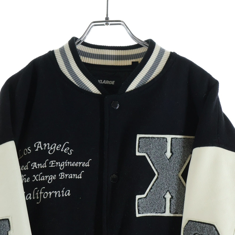 X-LARGE(エクストララージ) 23AW OG LOGO VARSITY JACKET ロゴエンブロイダリー アームレザー切替 バーシティジャケット ブラック 101234021009