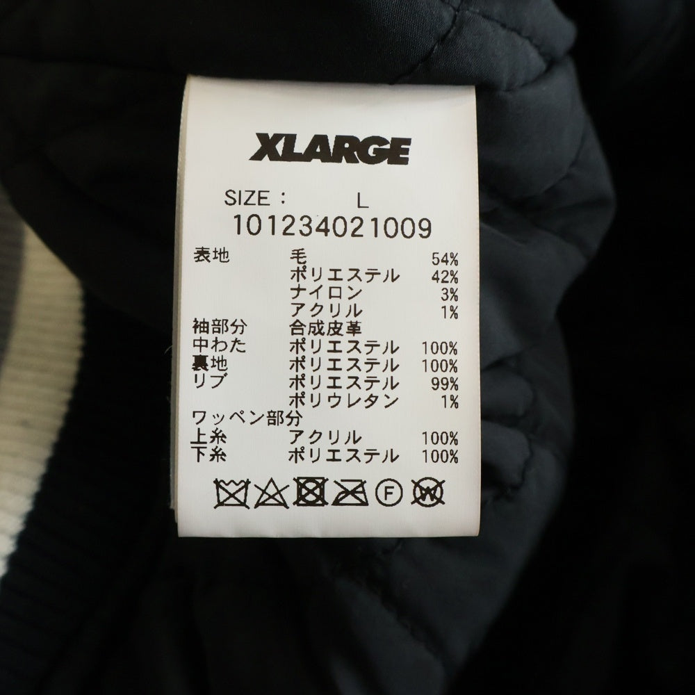 X-LARGE(エクストララージ) 23AW OG LOGO VARSITY JACKET ロゴエンブロイダリー アームレザー切替 バーシティジャケット ブラック 101234021009
