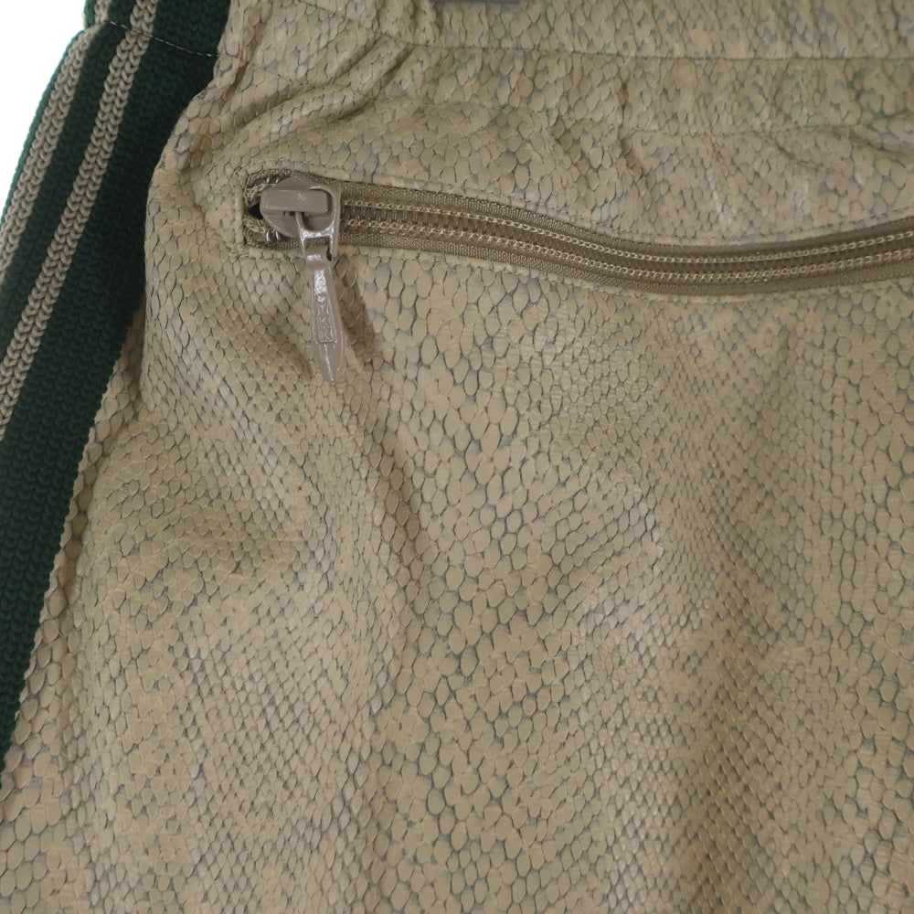 Needles(ニードルス) NARROW TRACK PANT SYNTHETIC LEATHER ナロー シンセティックレザー トラックパンツ ベージュ GL223