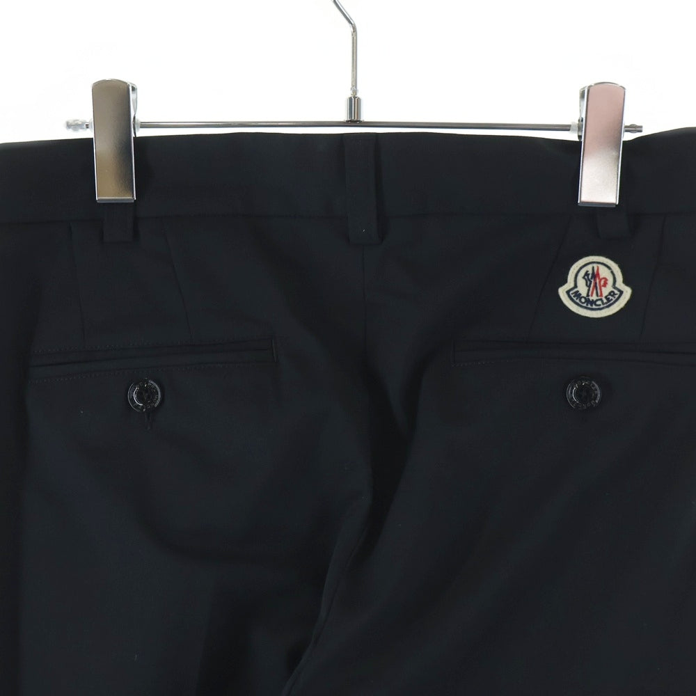 MONCLER(モンクレール) 24SS PANTALONE SPORTIVO パンタローネ スポルティーボ 2タック ボタンフライ ウール ポリエステル スラックスパンツ ブラック J109P2A00005 57695