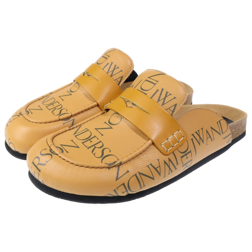 J.W.ANDERSON(ジェー ダブリュー アンダーソン) ロゴ総柄 レザー コインローファーミュール サンダル ブラウン ANM36516C