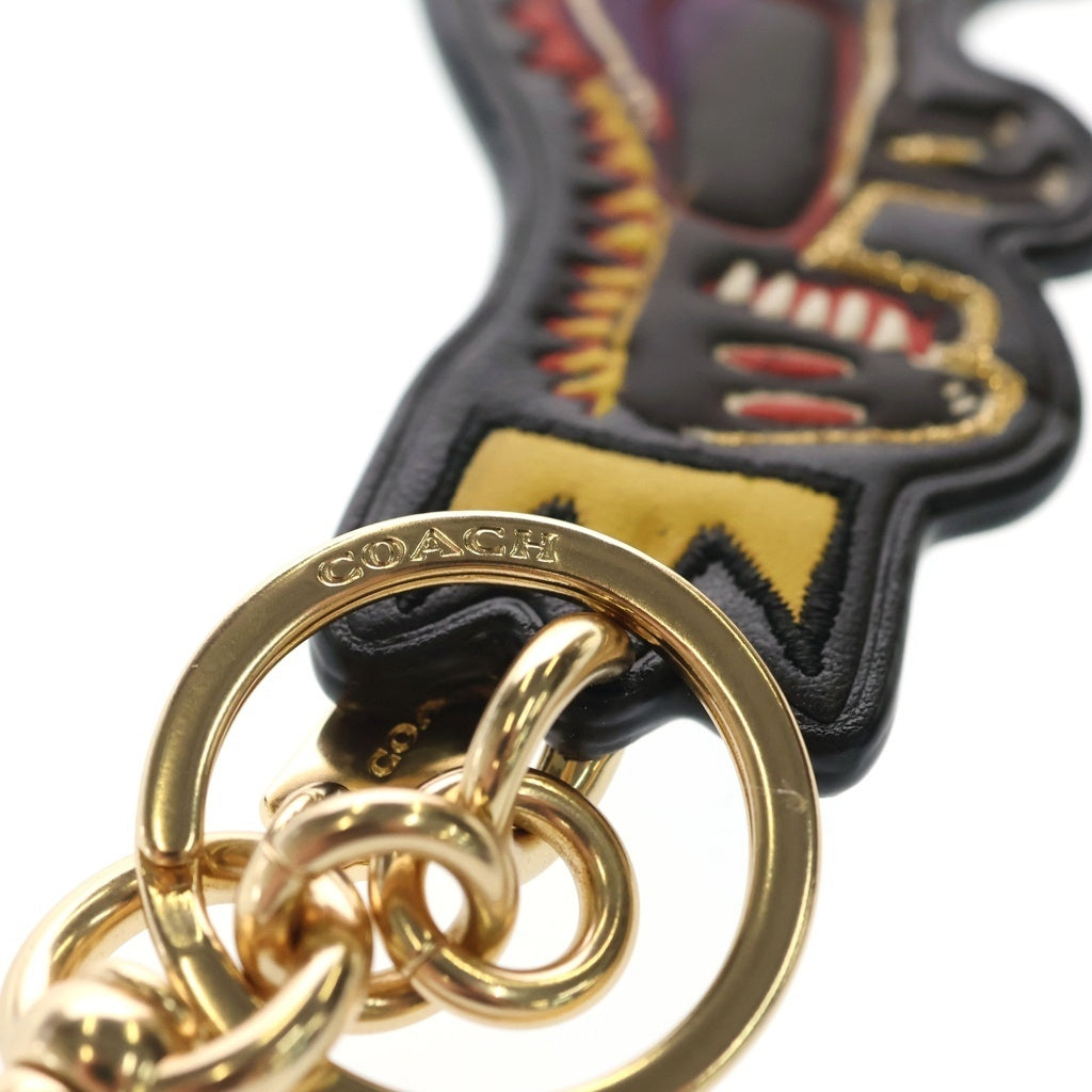 COACH(コーチ) ×JEAN MICHEL BASQUIAT REXY BAG CHARM バスキア 恐竜 バッグチャーム キーホルダー ブラック/ベージュ C5704 レディース