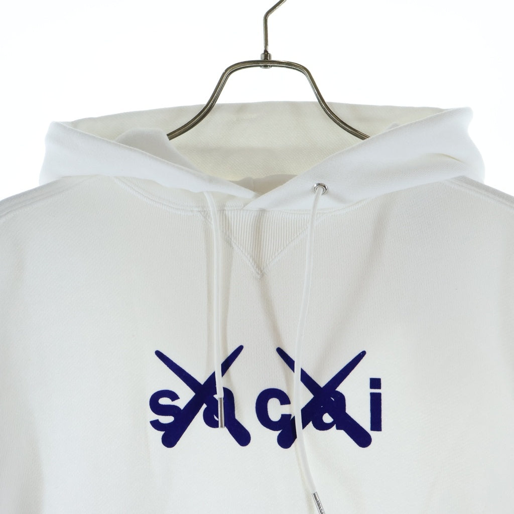 Sacai(サカイ) 21AW ×KAWS FLOCK PRINT HOODIE カウズ フロックプリント コットン プルオーバーフーディー パーカー ホワイト 21-0286S