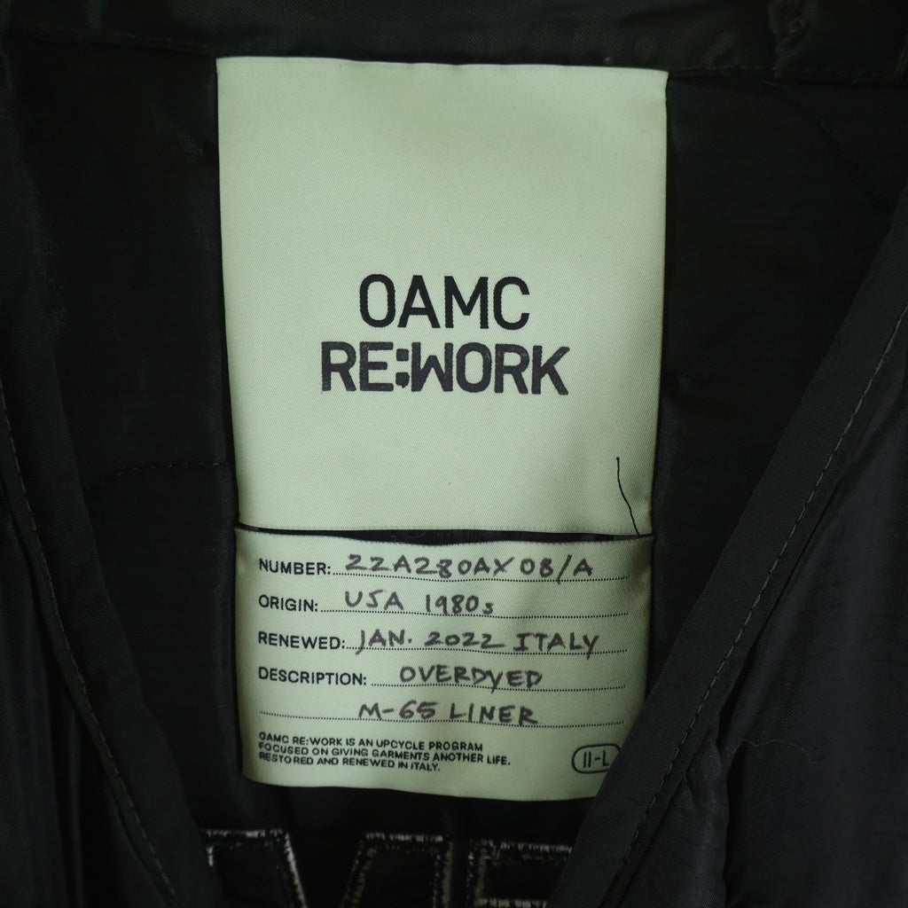 OAMC(オーエーエムシー) 22AW RE WORK OVERDYED M-65 LINER オーバーダイ ナイロン キルティング ロゴエンブロイダリー サイドカットライナー ブラック/グリーン 22A28OAX08