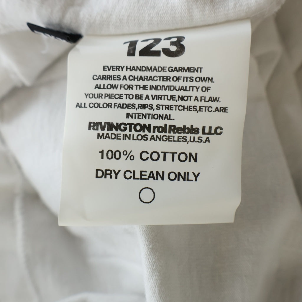 RRR123 RIVINGTON roi Rebis(リヴィントンロイレビス) METANOIA USO CVA TEE メタノイア ウソ シーブイエー ロゴデザインTシャツ 半袖クルーネックカットソー ホワイト