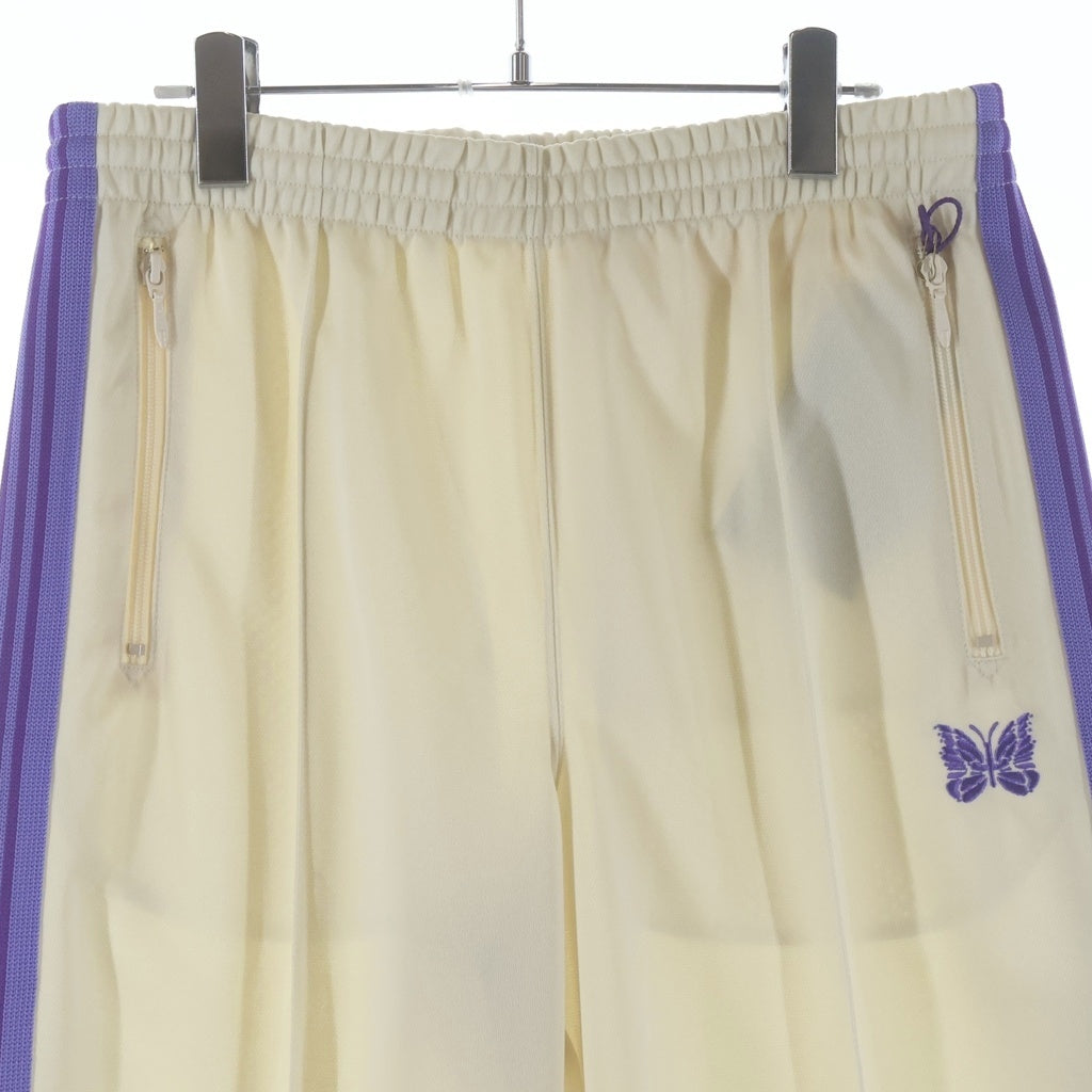 Needles(ニードルス) 23SS SPECIAL ZIPPED TRACK PANT スペシャル 裾ジッパー パピヨン刺繍 トラックパンツ ベージュ/パープル MR414