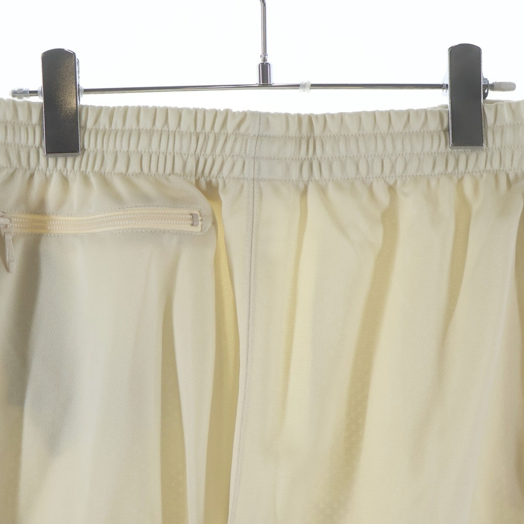 Needles(ニードルス) 23SS SPECIAL ZIPPED TRACK PANT スペシャル 裾ジッパー パピヨン刺繍 トラックパンツ ベージュ/パープル MR414