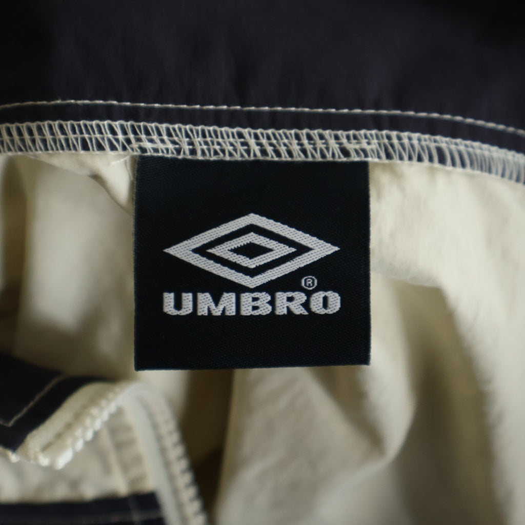 UMBRO(アンブロ) ×Adam et Rope アダムエロペ ロゴ刺繍 ナイロントラックジャケット アイボリー GKL-24390-A