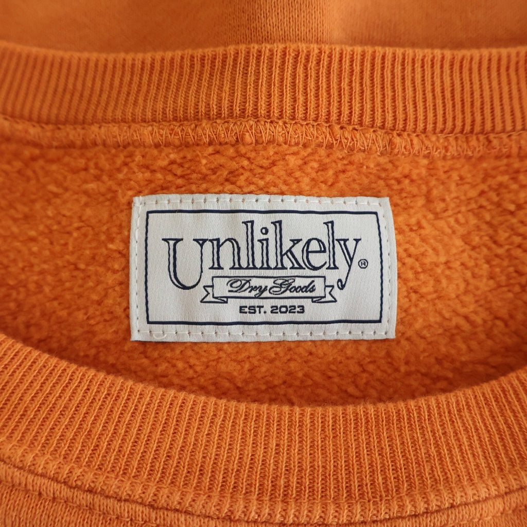 Unlikely(アンライクリー) 26SS Unlikely Raglan Sleeve Crew アンライクリー ラグランスリーブ クルーネックスウェット トレーナー オレンジ U26S-13-0003