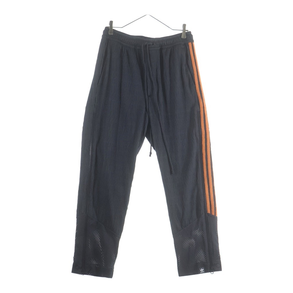 adidas(アディダス) ×SONG FOR THE MUTE SFTM PANT ソングフォーミュート サイドライン 裾ジッパー トラックパンツ グレー/オレンジ IK8598