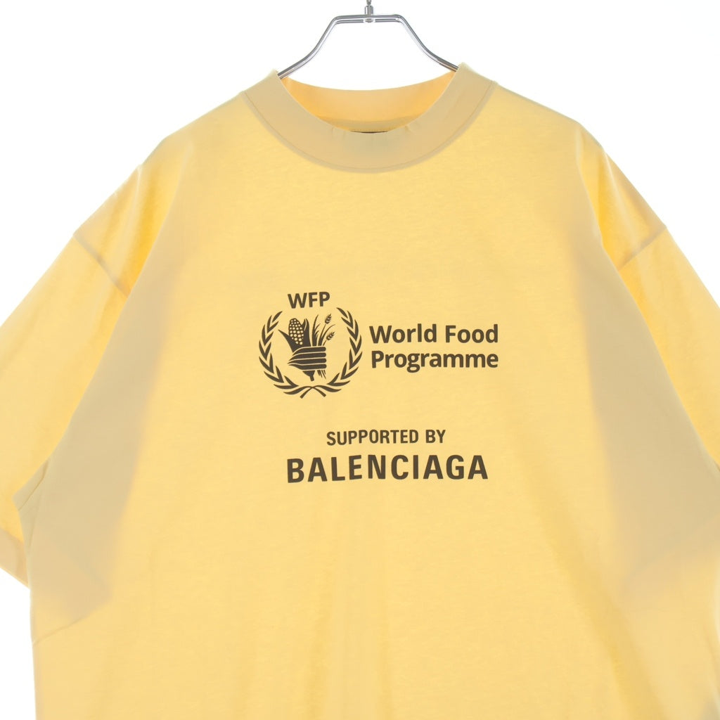 BALENCIAGA(バレンシアガ) WFP World Food Programme 両面ラバープリントTシャツ 半袖クルーネックカットソー イエロー 764235 TSVS9