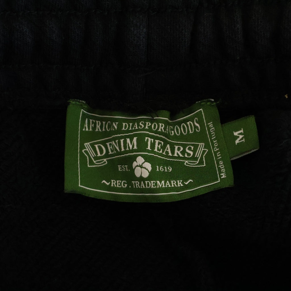 DENIM TEARS(デニムティアーズ) BIG COTTON WREATH SWEATPANTS ビッグコットンリース スウェットパンツ ブラック