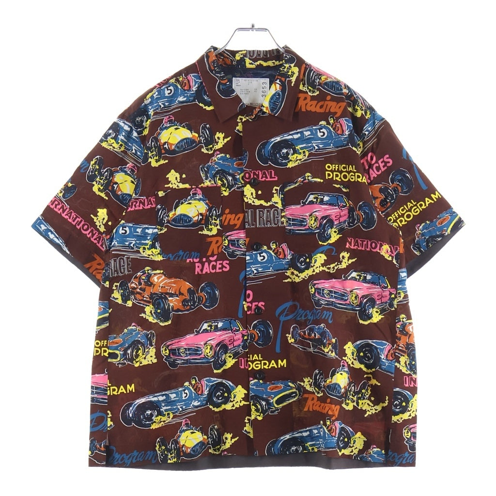 Sacai(サカイ) 25SS CAR RACE TROPICAL PRINT SHIRT カーレース トロピカル 総プリント 半袖 オープンカラーシャツ ブラウン 25-03653M