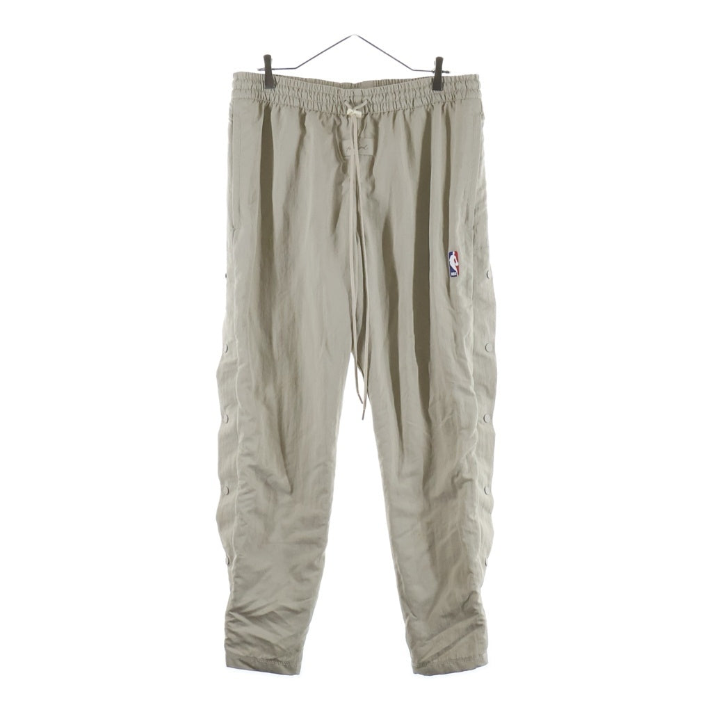 FEAR OF GOD(フィアオブゴッド) 20AW ×NIKE ×NBA M NRG W Warm Up Pant ナイキ エヌビーエー ウォームアップ ナイロンパンツ ベージュ CU4684-271