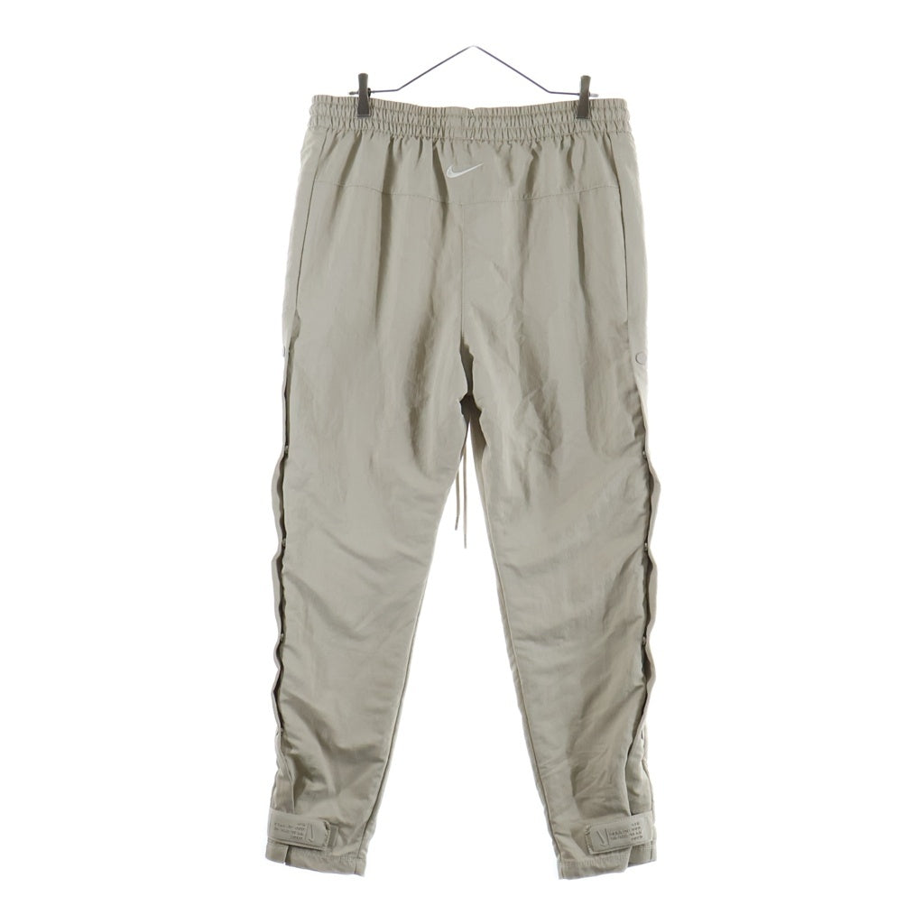 FEAR OF GOD(フィアオブゴッド) 20AW ×NIKE ×NBA M NRG W Warm Up Pant ナイキ エヌビーエー ウォームアップ ナイロンパンツ ベージュ CU4684-271