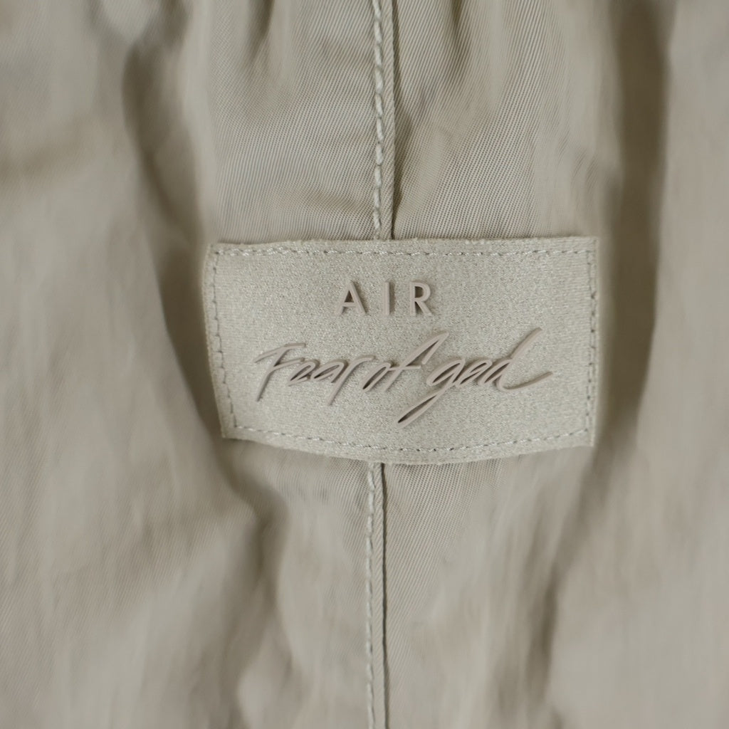 FEAR OF GOD(フィアオブゴッド) 20AW ×NIKE ×NBA M NRG W Warm Up Pant ナイキ エヌビーエー ウォームアップ ナイロンパンツ ベージュ CU4684-271