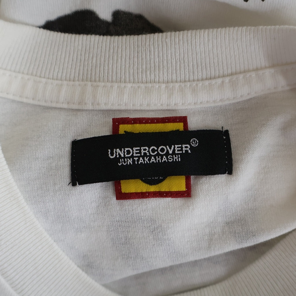 HUMAN MADE(ヒューマンメイド) ×UNDERCOVER LAST ORGY 2 LONG SLEEVE アンダーカバー ラストオージー グラフィック クルーネック 長袖Tシャツ カットソー ホワイト XX24CS002