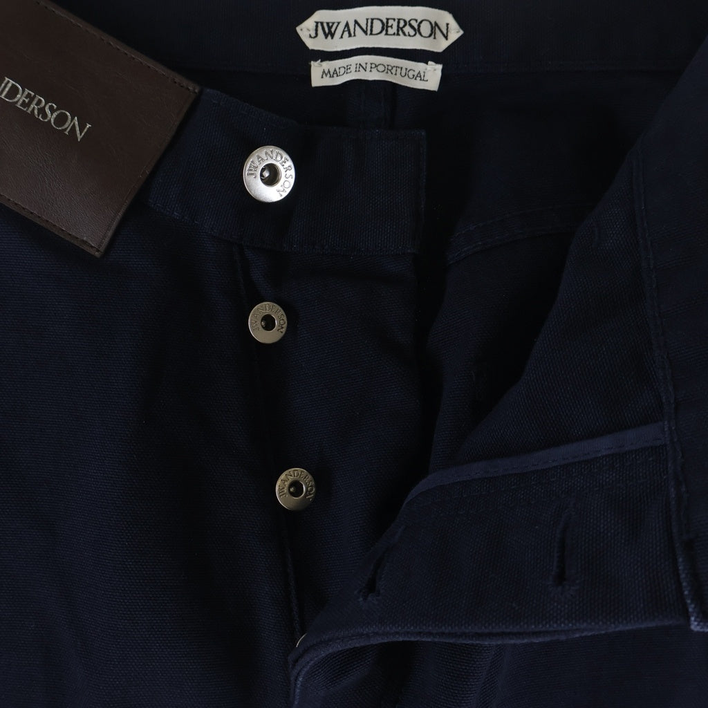 J.W.ANDERSON(ジェー ダブリュー アンダーソン) ×GUINNESS WORKWEAR TROUSERS ギネス ガーメントダイ加工 ロゴプリント レザーパッチワークウェアパンツ レディース ネイビー TR0427PG1963870