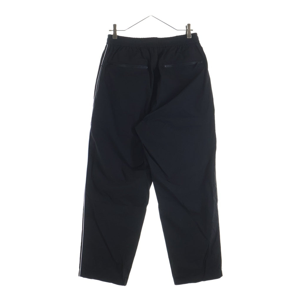 The Ennoy Professional(エンノイプロフェッショナル) 26SS PIPING NYLON TRACK PANT パイピング ナイロン トラック パンツ ブラック SS26BRENPT01LP