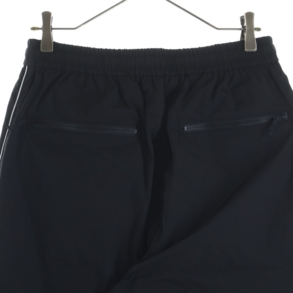 The Ennoy Professional(エンノイプロフェッショナル) 26SS PIPING NYLON TRACK PANT パイピング ナイロン トラック パンツ ブラック SS26BRENPT01LP