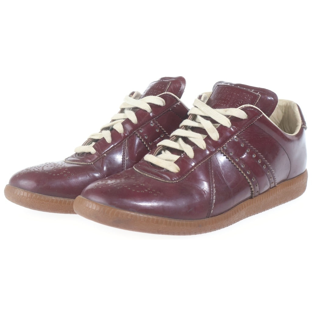 Maison Margiela(メゾンマルジェラ) REPLICA GERMAN TRAINER レプリカ ジャーマントレーナー パテントレザー パンチング加工 ローカットスニーカー バーガンディ レディース