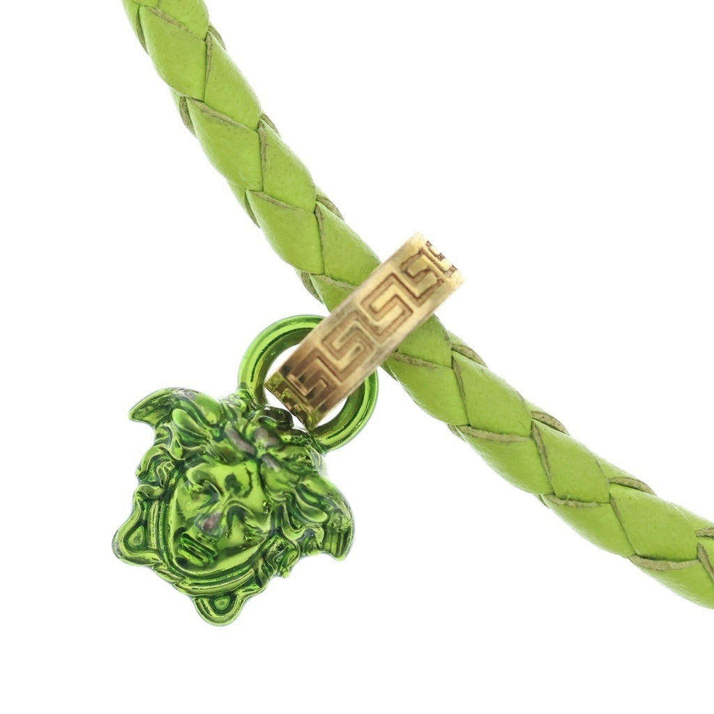 VERSACE(ヴェルサーチ) LEATHER CRYSTAL MEDUSA PENDANT NECKLESS レザー編み込み クリスタル メデューサ ロゴペンダント ネックレス イエロー 1GF1V レディース