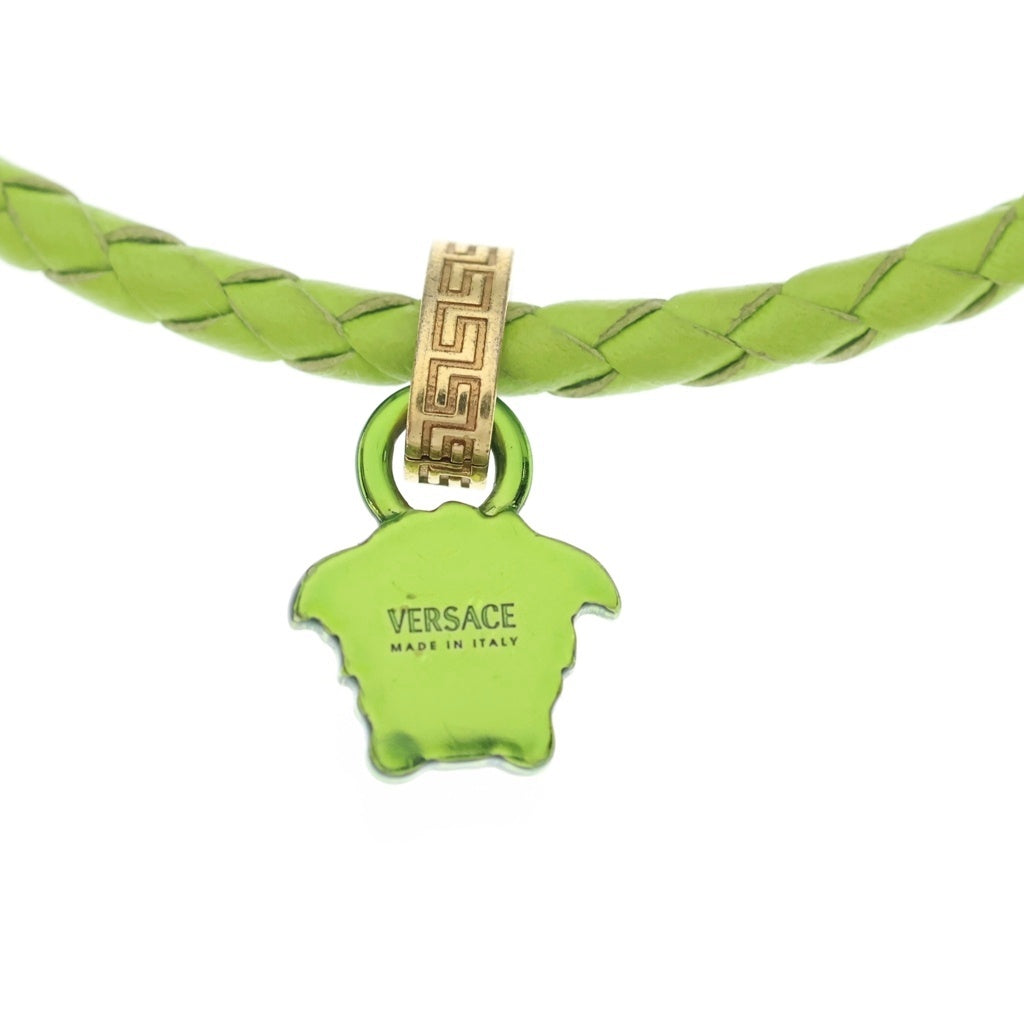 VERSACE(ヴェルサーチ) LEATHER CRYSTAL MEDUSA PENDANT NECKLESS レザー編み込み クリスタル メデューサ ロゴペンダント ネックレス イエロー 1GF1V レディース
