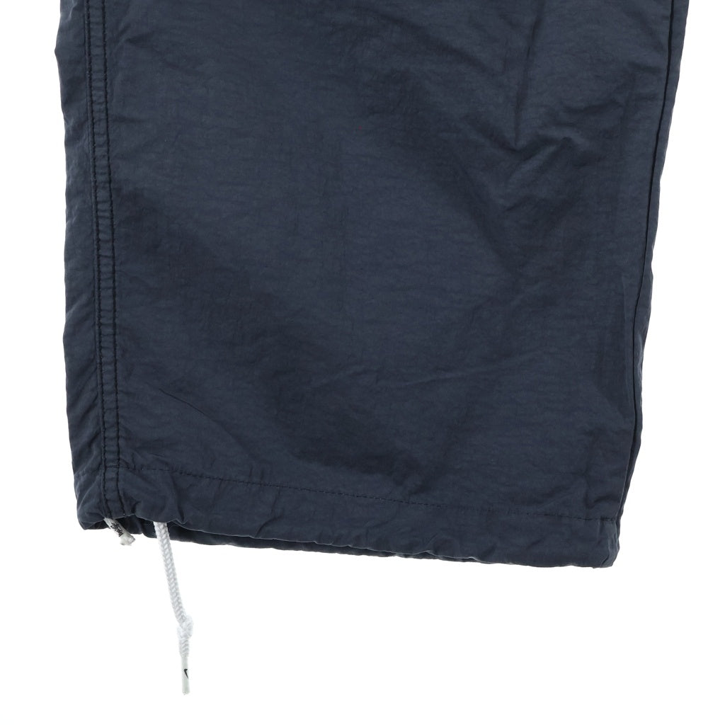 NIKE(ナイキ) ×STUSSY BEACH PANTS ステューシー ビーチ ロゴプリント ナイロンパンツ グレー CT4316-045