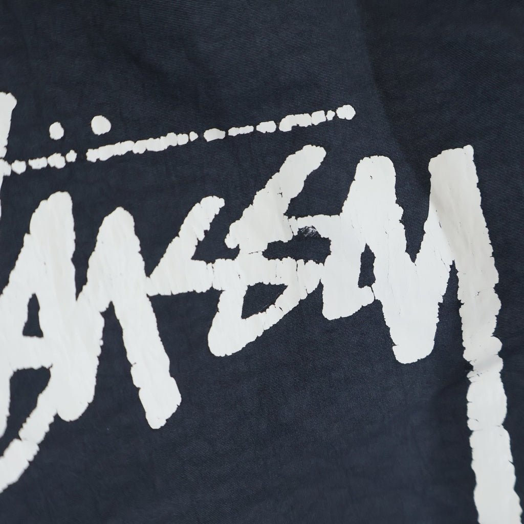 NIKE(ナイキ) ×STUSSY BEACH PANTS ステューシー ビーチ ロゴプリント ナイロンパンツ グレー CT4316-045