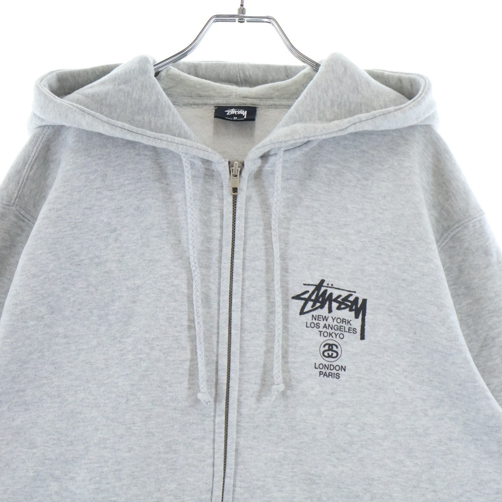STUSSY(ステューシー) WORLD TOUR ZIP UP HOODIE ワールドツアー ジップアップ フーデッド パーカー グレー