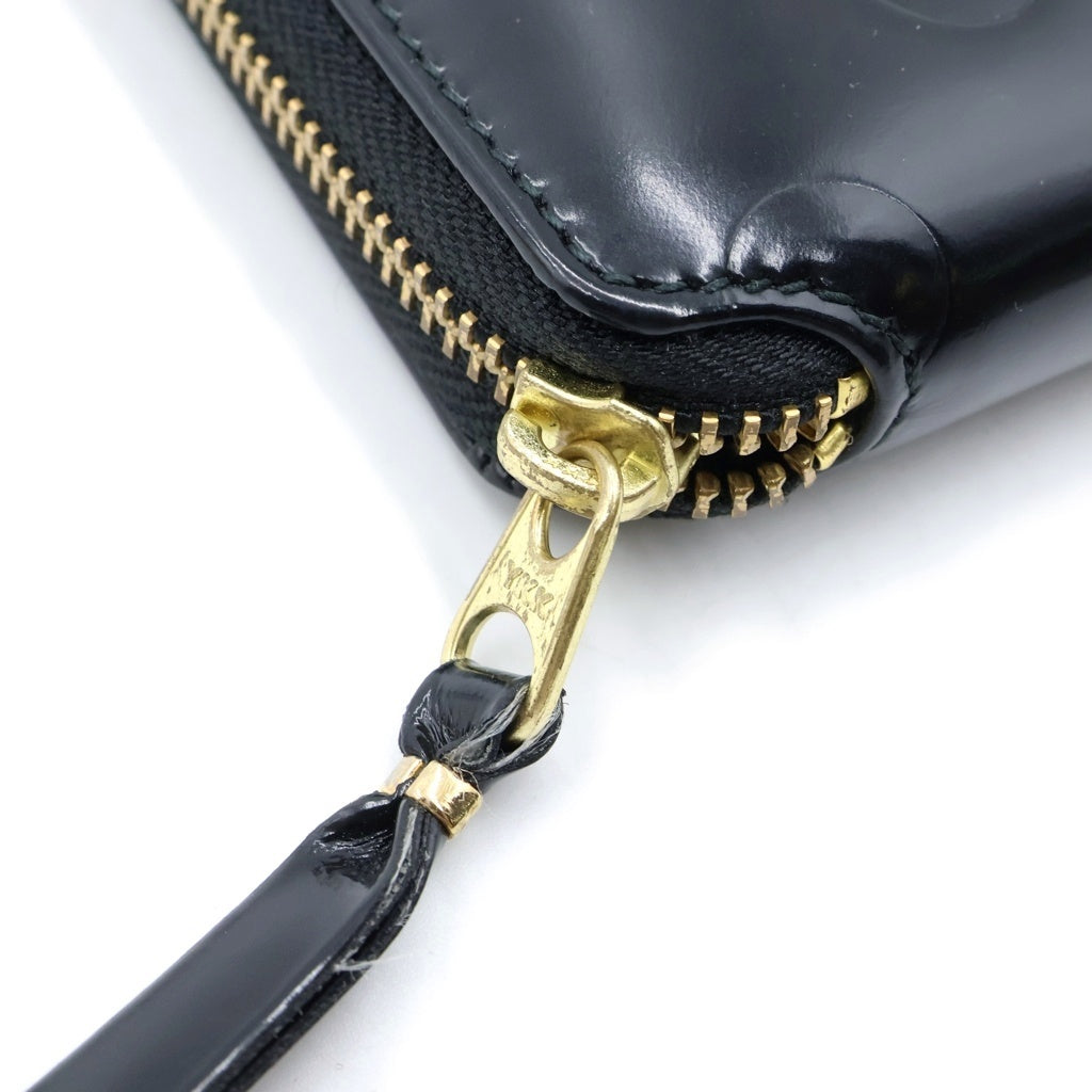 COMME des GARCONS(コムデギャルソン) BLACK POLKA DOTS EMBOSSED ポルカドットエンボス レザー ラウンドジップ 二つ折り財布 ウォレット ブラック SA2100NE レディース