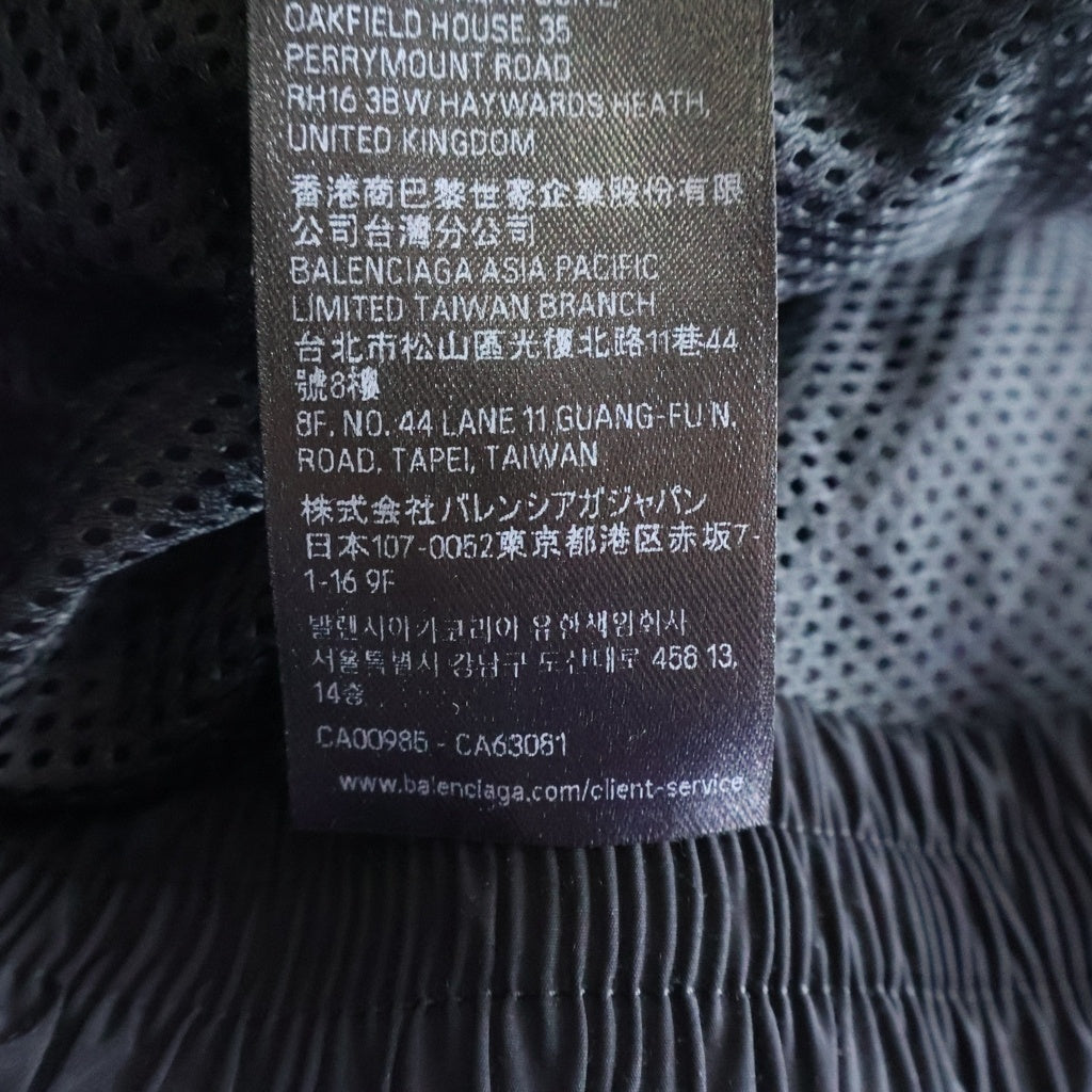 BALENCIAGA(バレンシアガ) TRACKSUIT JACKET 袖テープロゴ ループスポーツアイコンロゴ トラックスーツジャケット ジップアップブルゾン ブラック 851745 TPQ38