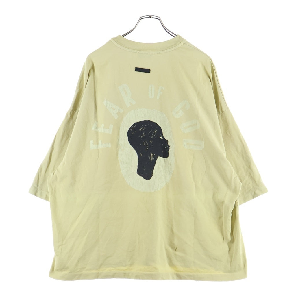 FEAR OF GOD ESSENTIALS(フィアオブゴッド エッセンシャルズ) 26SS LIBERATION NOW TEE リベレーションナウ 両面グラフィックプリントTシャツ 半袖クルーネックカットソー イエロー