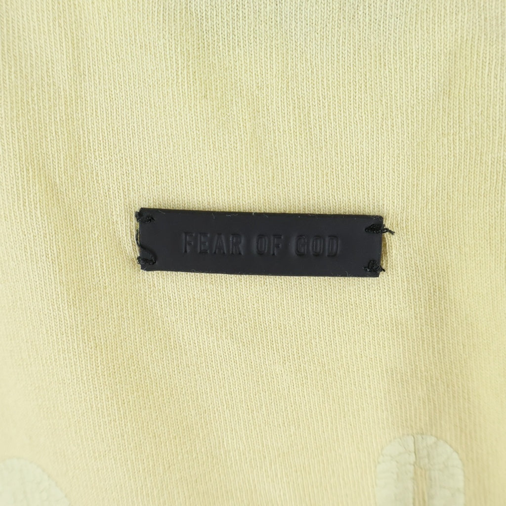 FEAR OF GOD ESSENTIALS(フィアオブゴッド エッセンシャルズ) 26SS LIBERATION NOW TEE リベレーションナウ 両面グラフィックプリントTシャツ 半袖クルーネックカットソー イエロー