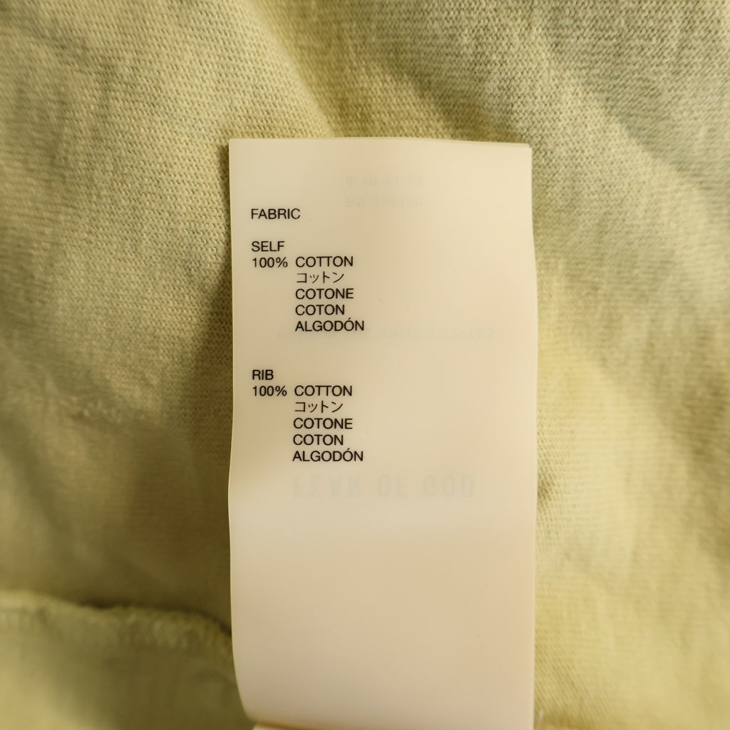 FEAR OF GOD ESSENTIALS(フィアオブゴッド エッセンシャルズ) 26SS LIBERATION NOW TEE リベレーションナウ 両面グラフィックプリントTシャツ 半袖クルーネックカットソー イエロー