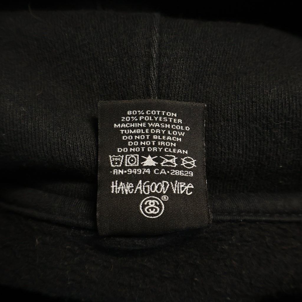 STUSSY(ステューシー) WORLD TOUR HOODIE ワールドツアー 両面プリント プルオーバーフーディー パーカー ブラック
