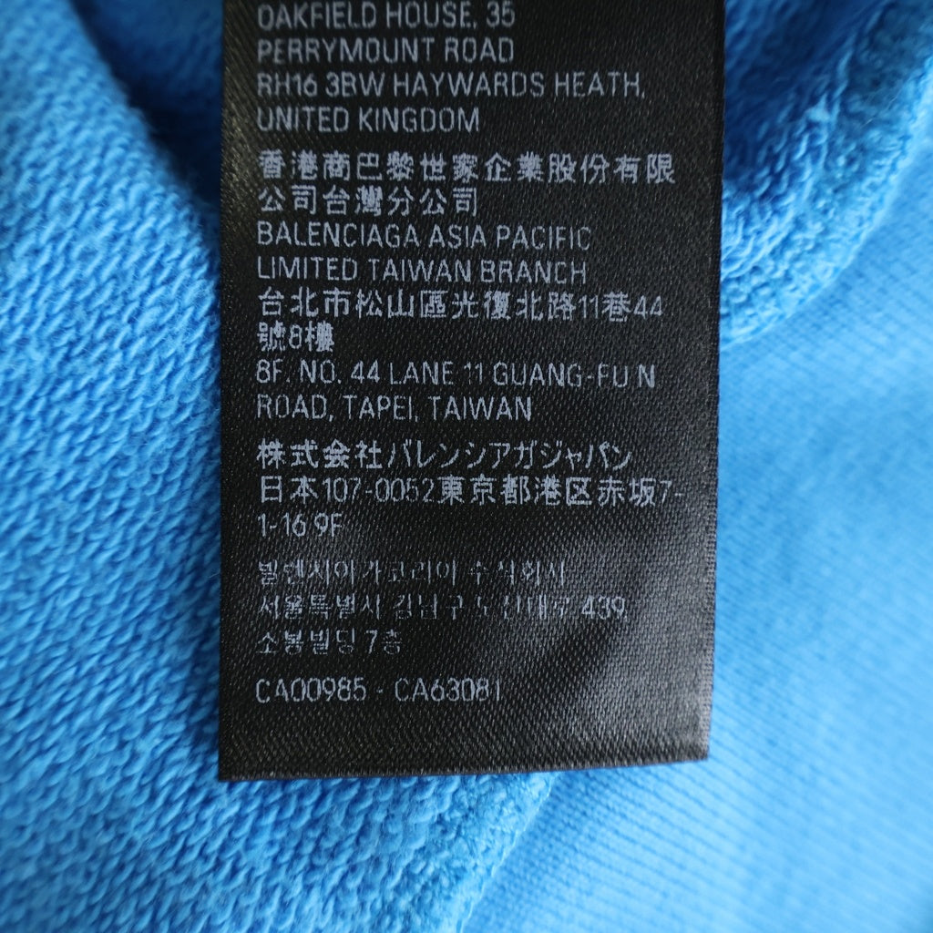 BALENCIAGA(バレンシアガ) 23SS MEDIUM FIT ZIP-UP HOODIE グラフィックペイントダメージ加工 スケータージップアップパーカー フーディー ブルー 744457 TOVA8