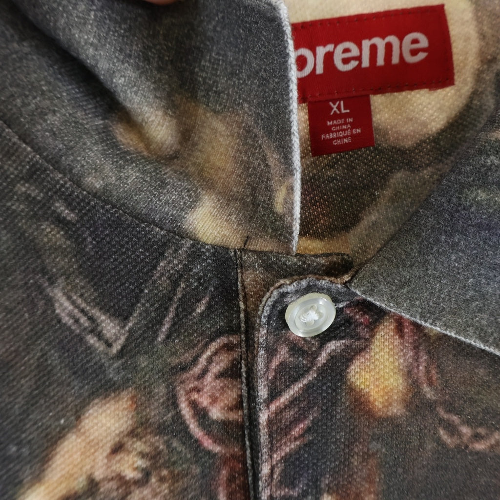 SUPREME(シュプリーム) 26AW Crucifixion Polo クルシフィクション 磔刑 総柄 半袖ポロシャツ ブラック