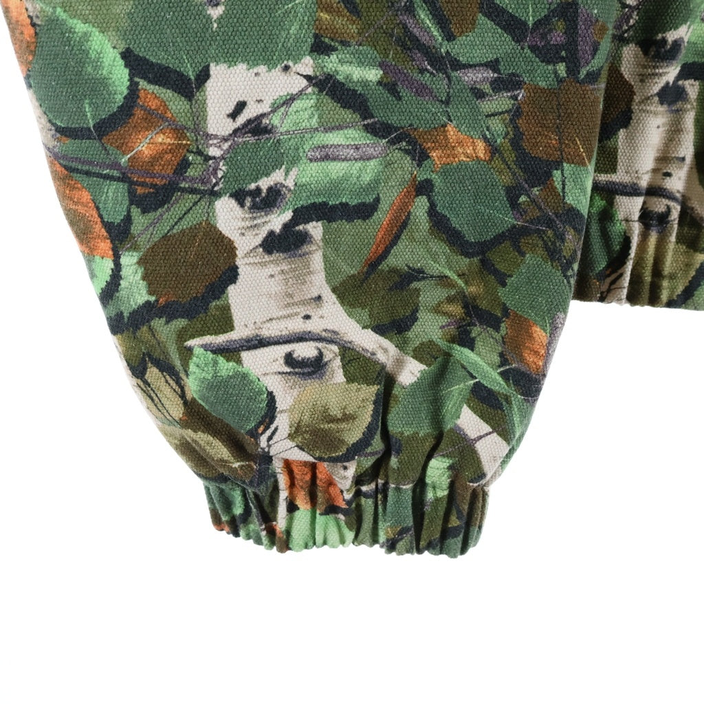 DENIM TEARS(デニムティアーズ) 26SS CAMO WORK JACKET カモ柄 ファーフーデッドワークジャケット カーキ SS26OLJ1356