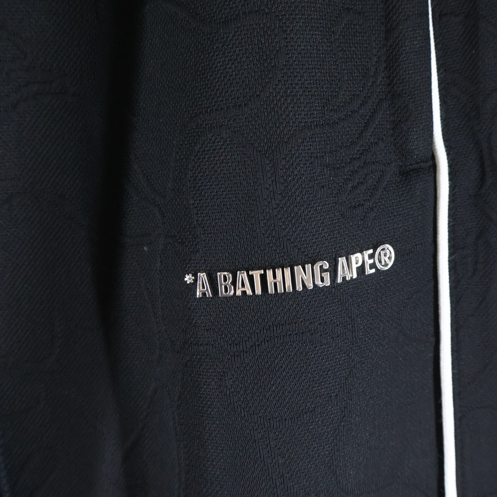 A BATHING APE(アベイシングエイプ) LINE CAMO JACQUARD METAL LOGO RELAXED FIT TRACK SWEAT PANTS ライン カモ メタルロゴ トラックパンツ ブラック 001PTL801317M