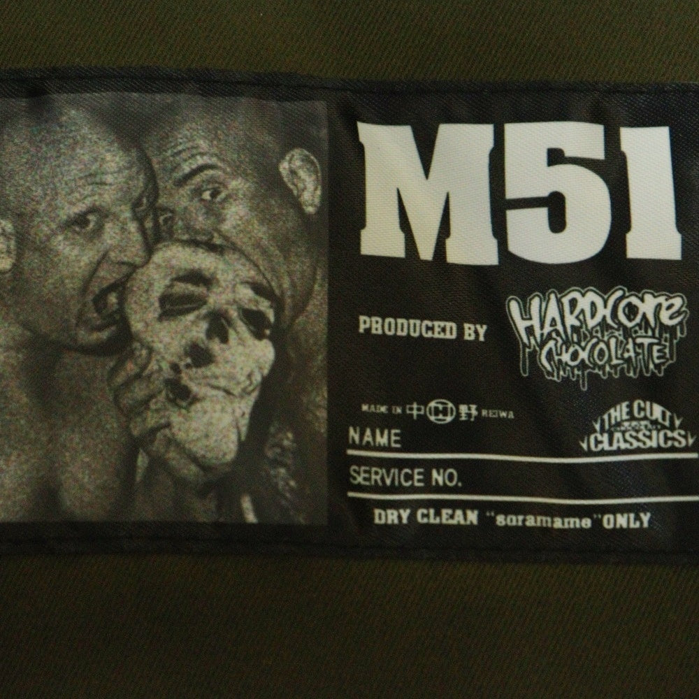 HARDCORE CHOCOLATE(ハードコアチョコレート) 23AW M-51 ロゴパッチ キルティングライナー ファー付きフーディ モッズコート カーキ HGCC2091