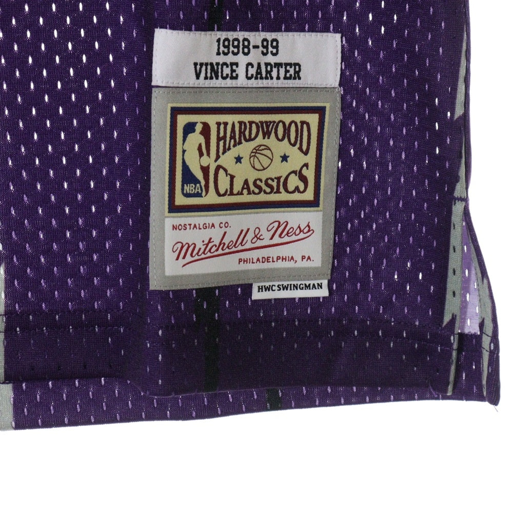 Mitchell&Ness(ミッチェル アンド ネス) 23SS NBA SWINGMAN ROAD JERSEY RAPTORS 98 VINCE CARTER ユニフォーム タンクトップ カットソー パープル/レッド SMJYGS18214-TRAPURP98VCA